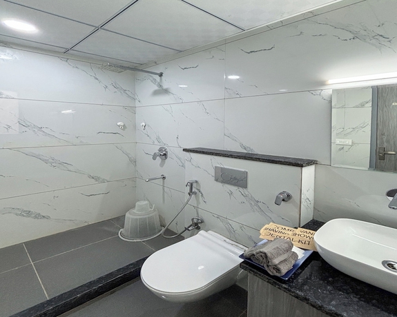 Imagen de la habitación del Hotel Housr Studio Rooms Sector 30 Gurgaon. Foto 13