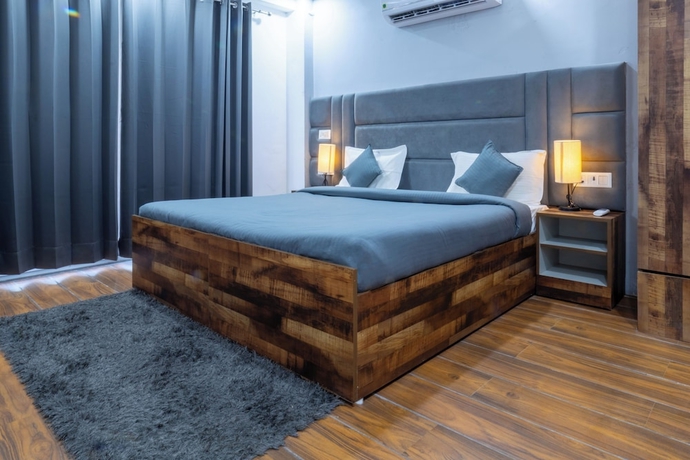 Imagen de la habitación del Hotel Housr Studio Rooms Sector 38 Gurgaon. Foto 6