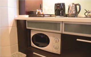 Imagen de la habitación del Hotel Howard Johnson All Suites. Foto 13