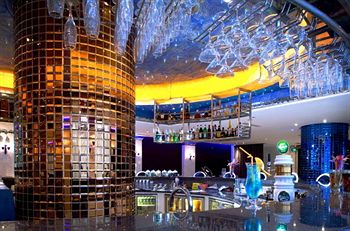 Imagen del bar/restaurante del Hotel Howard Johnson All Suites Suzhou. Foto 3
