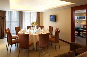Imagen del bar/restaurante del Hotel Howard Johnson All Suites Suzhou. Foto 4