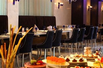 Imagen de la habitación del Hotel Howard Johnson All Suites Suzhou. Foto 8