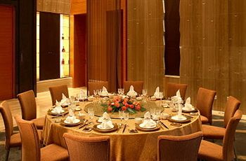 Imagen del bar/restaurante del Hotel Howard Johnson All Suites Suzhou. Foto 5