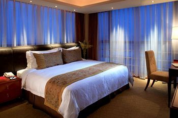 Imagen de la habitación del Hotel Howard Johnson All Suites Suzhou. Foto 9