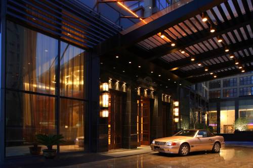 Imagen de los exteriores del Hotel Howard Johnson All Suites Suzhou. Foto 13
