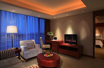 Imagen de la habitación del Hotel Howard Johnson All Suites Suzhou. Foto 11