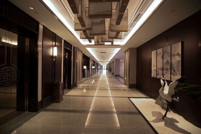 Imagen de los interiores del Hotel Howard Johnson By Wyndham Bayan Plaza Qidong. Foto 10