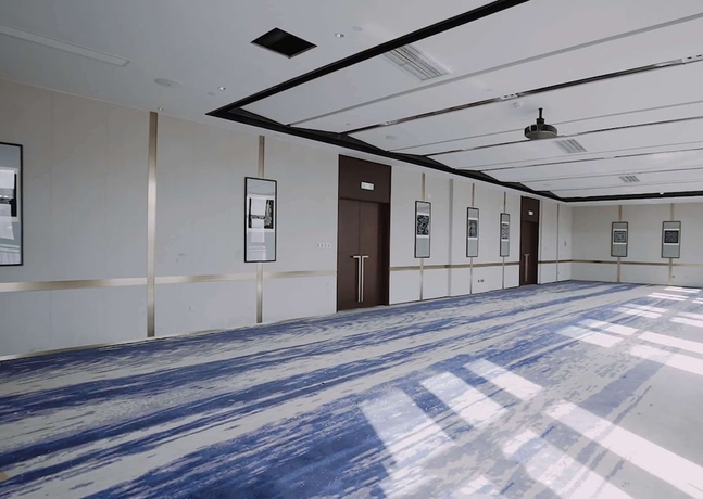 Imagen de los interiores del Hotel Howard Johnson By Wyndham Bayan Plaza Qidong. Foto 18