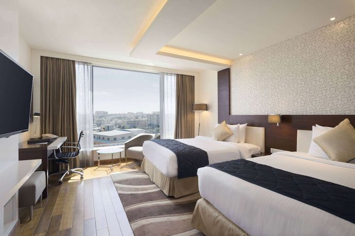 Imagen de la habitación del Hotel Howard Johnson By Wyndham Bengaluru Hebbal. Foto 2