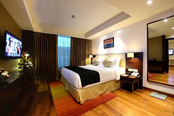 Imagen de la habitación del Hotel Howard Johnson By Wyndham Bengaluru Hebbal. Foto 5