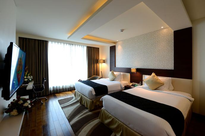 Imagen de la habitación del Hotel Howard Johnson By Wyndham Bengaluru Hebbal. Foto 10