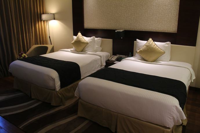 Imagen de la habitación del Hotel Howard Johnson By Wyndham Bengaluru Hebbal. Foto 11