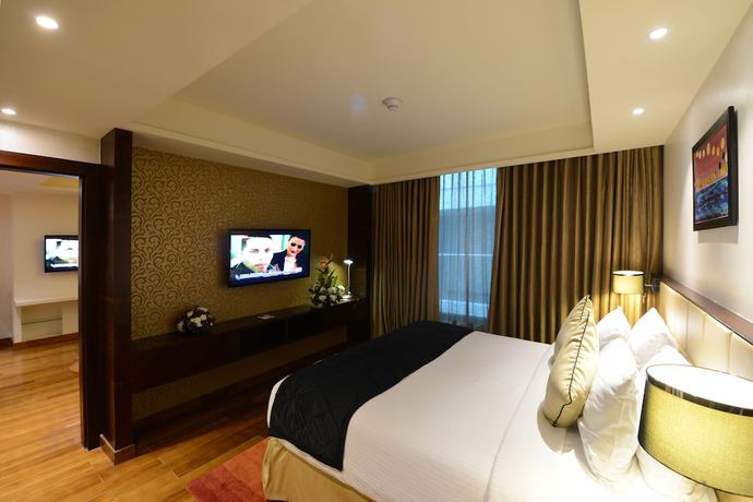 Imagen de la habitación del Hotel Howard Johnson By Wyndham Bengaluru Hebbal. Foto 12