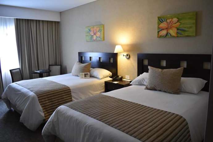 Imagen de la habitación del Hotel Howard Johnson By Wyndham Funes. Foto 11