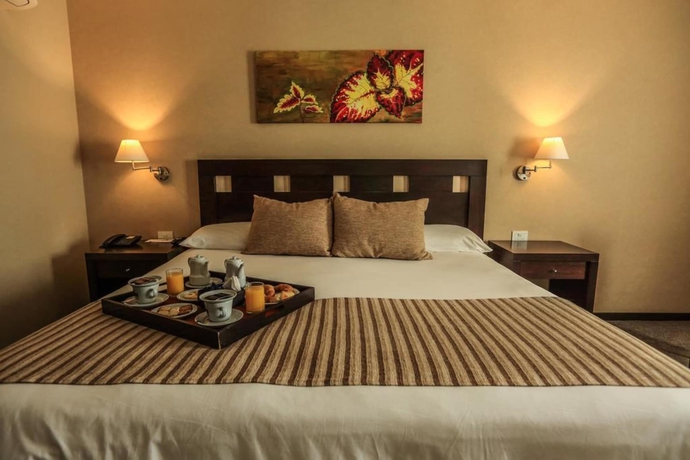 Imagen de la habitación del Hotel Howard Johnson By Wyndham Funes. Foto 12