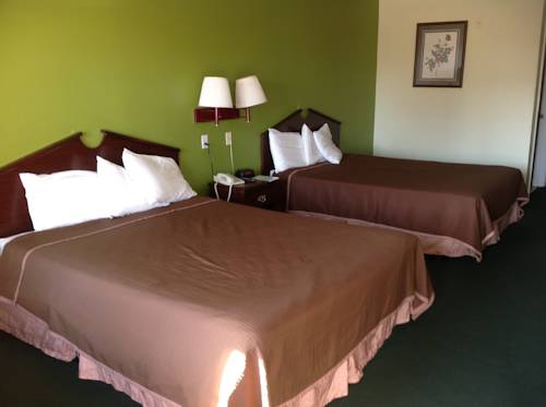 Imagen de la habitación del Hotel Howard Johnson By Wyndham Grand Prairie Near Lone Star Park. Foto 9