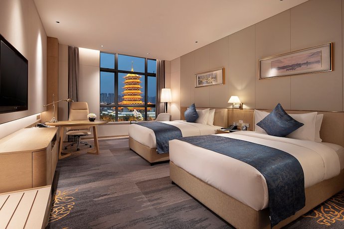 Imagen de la habitación del Hotel Howard Johnson By Wyndham Jimei Lake Plaza Xiamen. Foto 3