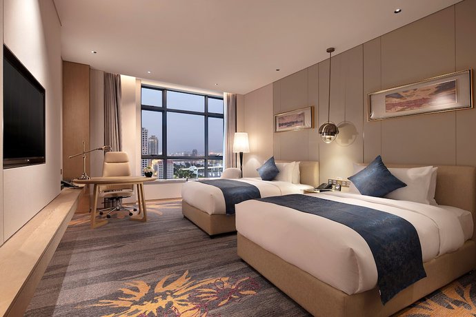 Imagen de la habitación del Hotel Howard Johnson By Wyndham Jimei Lake Plaza Xiamen. Foto 6