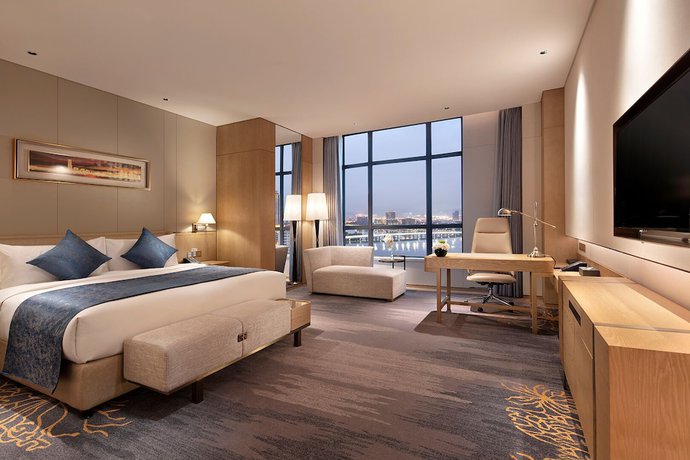 Imagen de la habitación del Hotel Howard Johnson By Wyndham Jimei Lake Plaza Xiamen. Foto 18