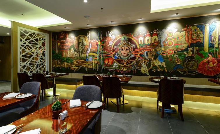 Imagen del bar/restaurante del Hotel Howard Johnson By Wyndham Kolkata. Foto 4
