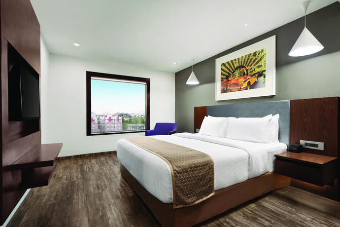 Imagen de la habitación del Hotel Howard Johnson By Wyndham Kolkata. Foto 11
