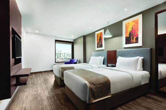 Imagen de la habitación del Hotel Howard Johnson By Wyndham Kolkata. Foto 12