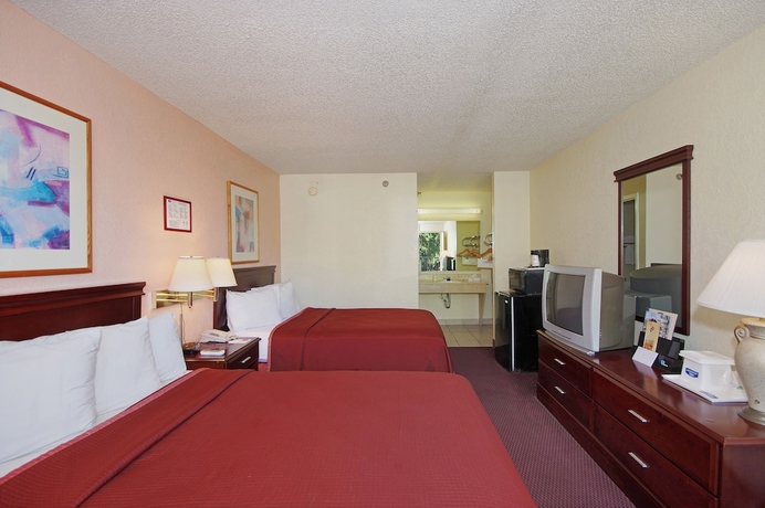 Imagen de la habitación del Hotel Howard Johnson By Wyndham Tropical Palms Kissimmee. Foto 4