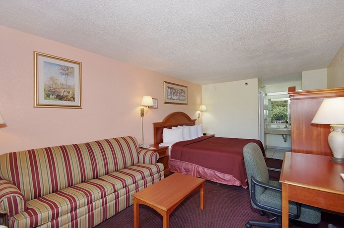 Imagen de la habitación del Hotel Howard Johnson By Wyndham Tropical Palms Kissimmee. Foto 8