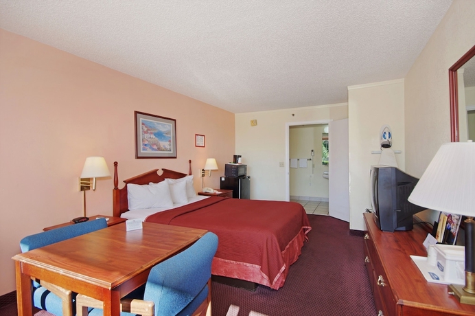 Imagen de la habitación del Hotel Howard Johnson By Wyndham Tropical Palms Kissimmee. Foto 13