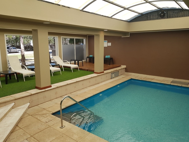Imagen de la piscina del Hotel Howard Johnson By Wyndham, Villa General Belgrano. Foto 18