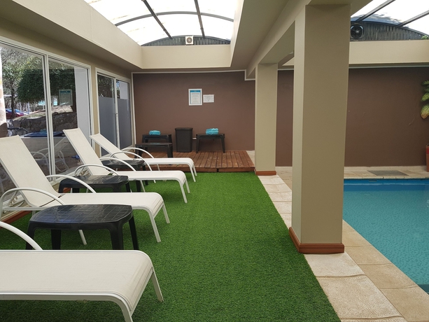 Imagen de la piscina del Hotel Howard Johnson By Wyndham, Villa General Belgrano. Foto 19