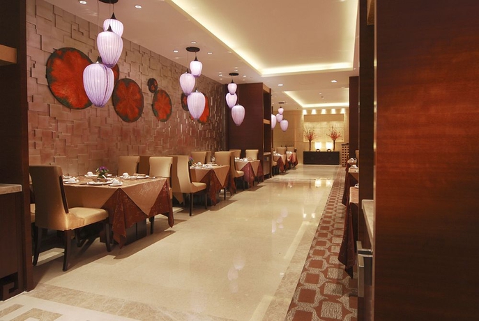Imagen del bar/restaurante del Hotel Howard Johnson Caida Plaza Shanghai. Foto 3