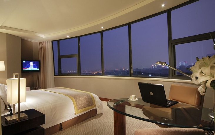 Imagen de la habitación del Hotel Howard Johnson Caida Plaza Shanghai. Foto 5