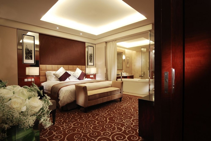 Imagen de la habitación del Hotel Howard Johnson Caida Plaza Shanghai. Foto 6