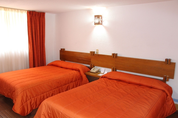 Imagen de la habitación del Hotel Howard Johnson Calle Real Morelia. Foto 19