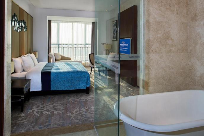Imagen de la habitación del Hotel Howard Johnson Dream Sea Resort Weihai. Foto 7