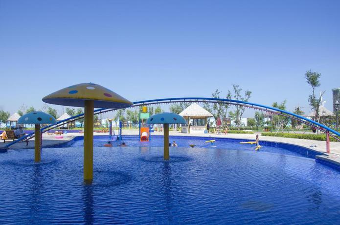 Imagen de la piscina del Hotel Howard Johnson Dream Sea Resort Weihai. Foto 16