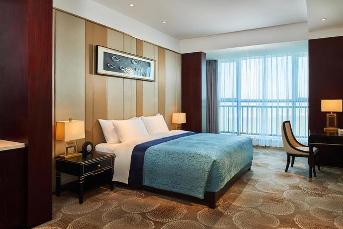 Imagen de la habitación del Hotel Howard Johnson Dream Sea Resort Weihai. Foto 9