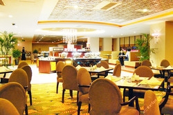Imagen del bar/restaurante del Hotel Howard Johnson Grand Hotel Shenyang. Foto 2