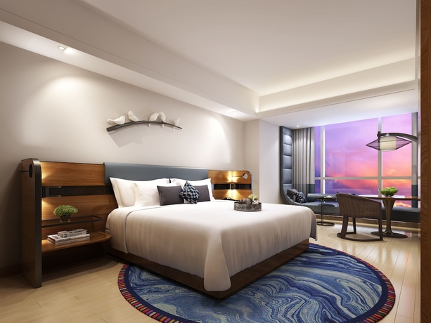 Imagen de la habitación del Hotel Howard Johnson Hot Spring Resort Anshun. Foto 7