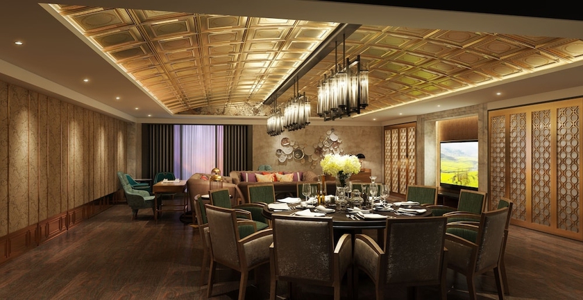 Imagen del bar/restaurante del Hotel Howard Johnson Hot Spring Resort Anshun. Foto 2