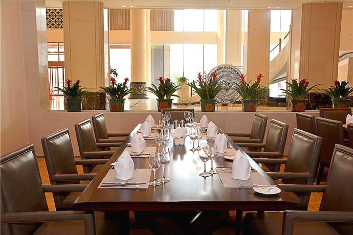 Imagen del bar/restaurante del Hotel Howard Johnson Hotel Jiyuan Hong'an. Foto 2