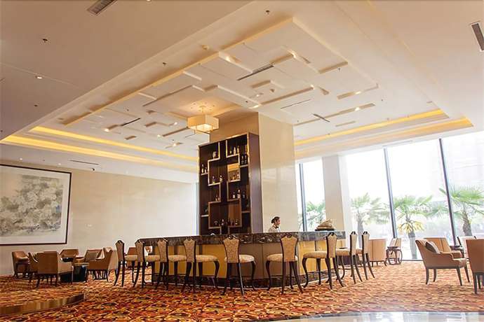 Imagen del bar/restaurante del Hotel Howard Johnson Hotel Jiyuan Hong'an. Foto 3