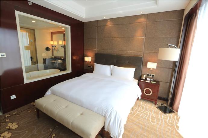 Imagen de la habitación del Hotel Howard Johnson Hotel Jiyuan Hong'an. Foto 7