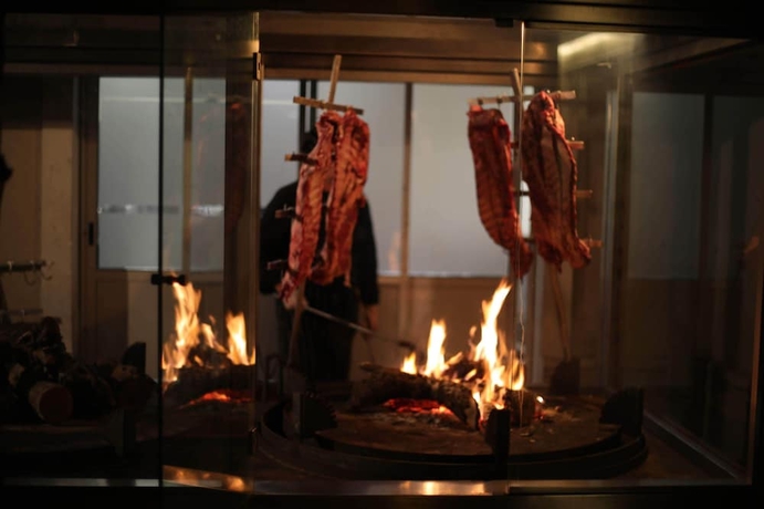 Imagen del bar/restaurante del Hotel Howard Johnson Hotel & Convention Center by Wyndham, Merlo. Foto 3