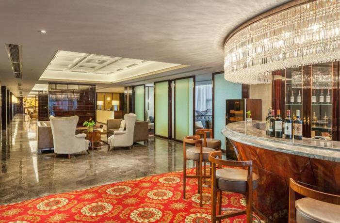 Imagen del bar/restaurante del Hotel Howard Johnson Huachen Plaza Changsha. Foto 4