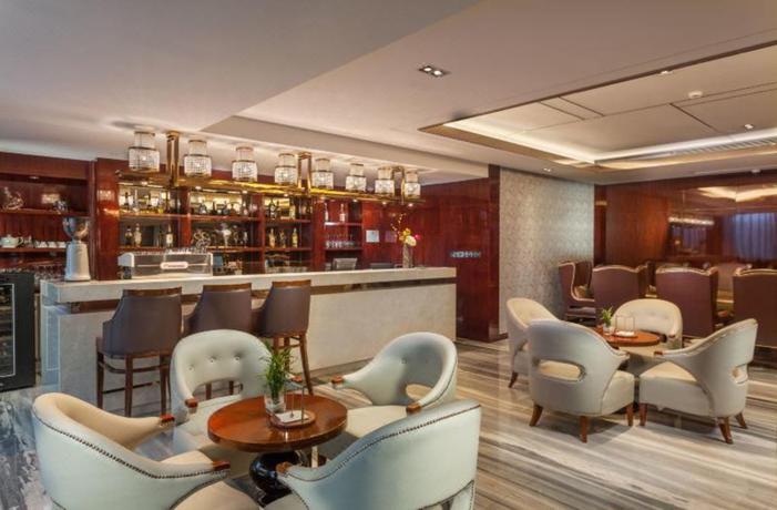 Imagen del bar/restaurante del Hotel Howard Johnson Huachen Plaza Changsha. Foto 5
