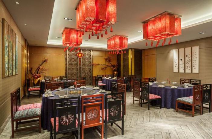 Imagen del bar/restaurante del Hotel Howard Johnson Huachen Plaza Changsha. Foto 6