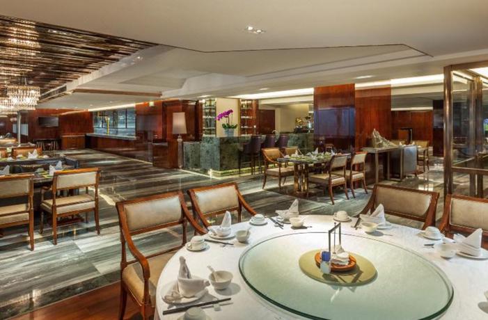 Imagen del bar/restaurante del Hotel Howard Johnson Huachen Plaza Changsha. Foto 7