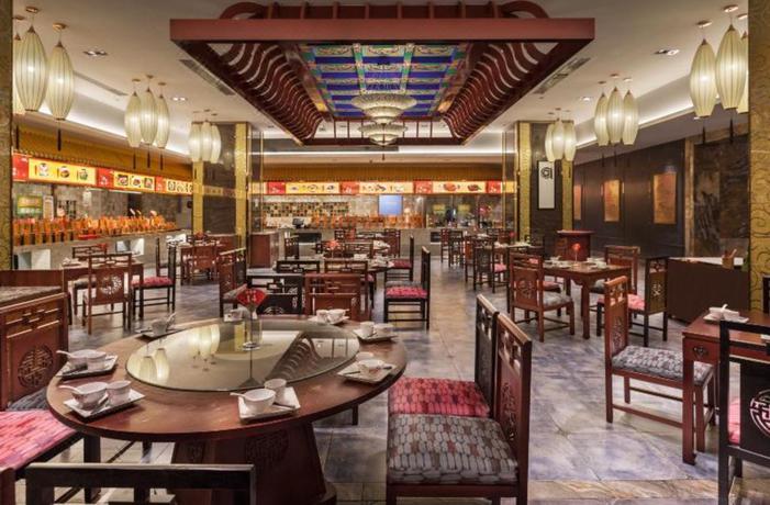 Imagen del bar/restaurante del Hotel Howard Johnson Huachen Plaza Changsha. Foto 8